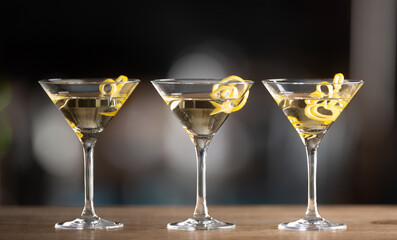 Dry Martini short drink cocktail with gin, dry vermouth and a lemon zest garnish