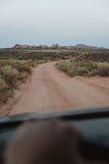 Driving Down a Dirt Road - 411641559