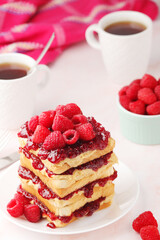 Sandwiches with peanut butter and raspberry jam