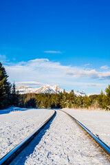 Fototapeta premium Vertical view of a railroad in Alberta, Canada