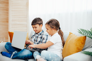 child using laptop  