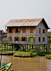 Traditional teak floating lake house Inle Lake Burma