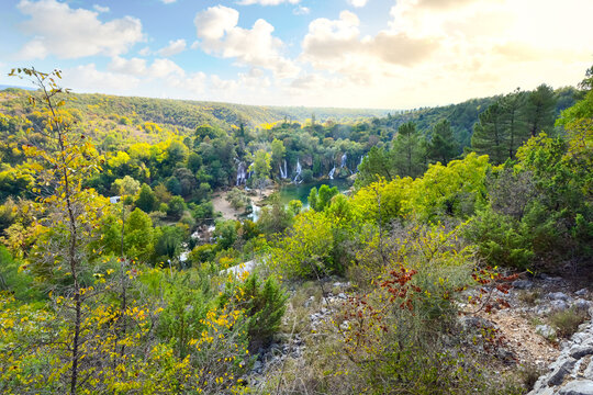View from a hill looking down over the Kravica Waterfalls on the Trebizat River in the Karstic heartland of Bosnia and Herzegovina.