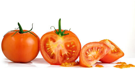 Juicy tomatoes - Whole, halved, and sliced against a white background