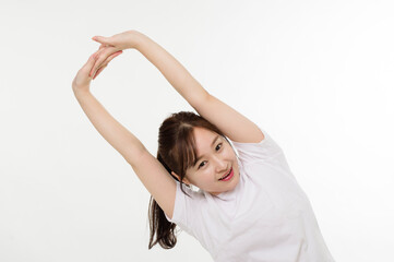 Fototapeta na wymiar 健康維持のための体操をする女性