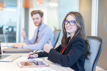 Office employees having a meeting