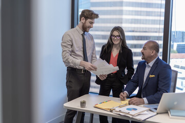 Office employees having a meeting