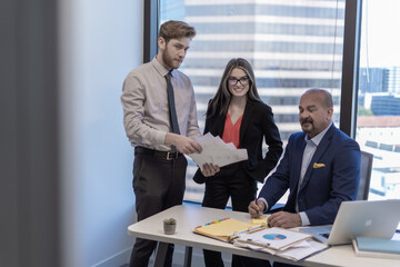 Office employees having a meeting