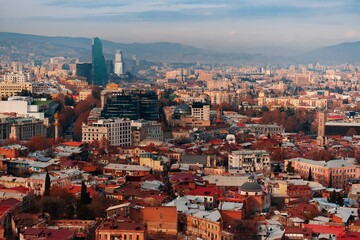 Top view of the center of Tbilisi. Old red roofs and local landmarks in Georgia.