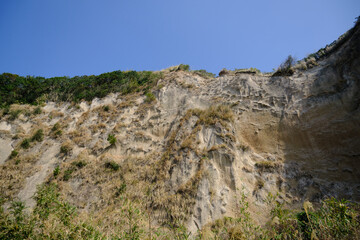 Fototapeta na wymiar 江口浜にある絶壁の風景