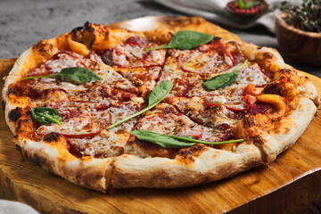 Pepperoni Pizza on Wooden Trat with Textile Napkin