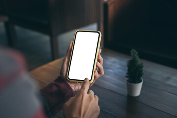 cell phone blank white screen mockup.woman hand holding texting using mobile on desk at office.background empty space for advertise.work people contact marketing business,technology