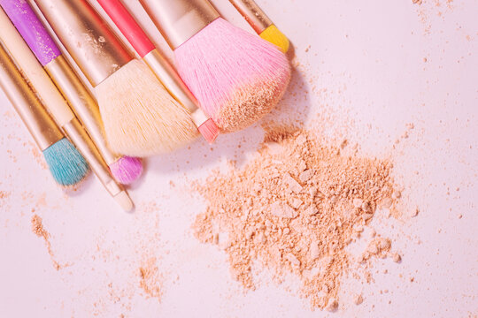 Make Up Brushes With Powder On White Background