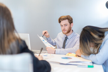 Office employees having a meeting