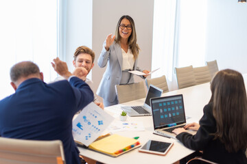 Office employees having a meeting