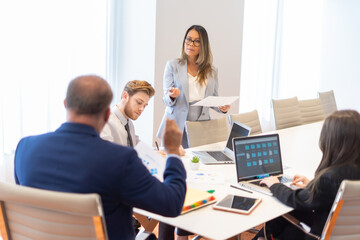 Office employees having a meeting