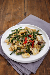 Oseng tahu kacang panjang, or stir-fried cook of sliced tofu and yardlong bean with spices