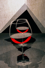 Geometric still life "Pyramid" with a glass of red wine