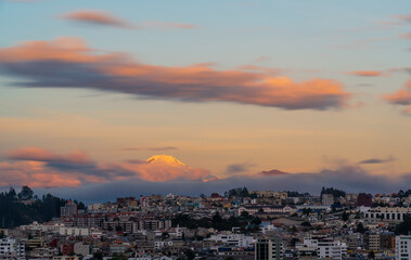 Cayambe volcano sunset and Quito city, Ecuador.