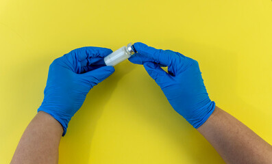 Flat Lay for medical theme and vaccinations from COVID-19. Medicine, vaccine, hands of a doctor