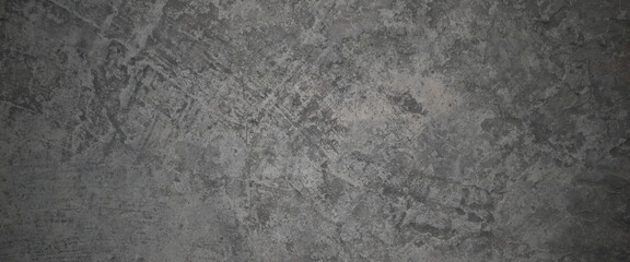 Fototapeta na wymiar Horizontal dark old cement wall for the background