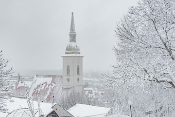 church in the Bratislava old town in the snow in winter