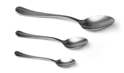 Set of silver spoons cutlery isolated on white