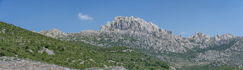 Fototapeta na wymiar Panoramic rocky peak limestone near Dalmatia in Croatia