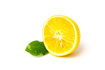 Lemon slice with green leaf isolated on white