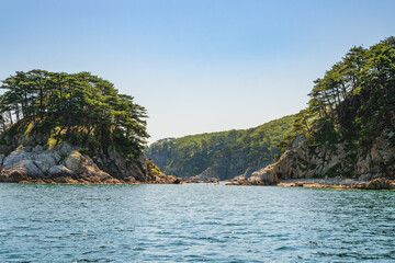 Naklejka premium An island of languishing hearts. Peter the Great Bay. Sea of Japan. A favorite place of water excursions on boats.