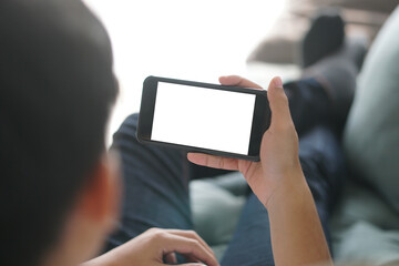 hand holdng smart mobile smartphone with white blank screen