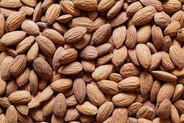 Roasted organic almond background. Food background.