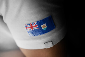 Patch of the national flag of the Anguilla on a white t-shirt