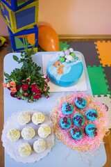 Homemade cupcakes on the background of a children's holiday - birthday.