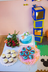 Homemade cupcakes on the background of a children's holiday - birthday.