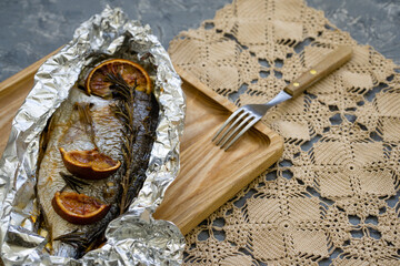 Season with rosemary and citrus. Barbecue fish for a family meeting