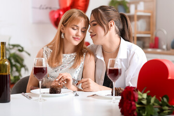 Happy transgender couple celebrating Valentine's Day at home