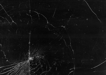 Shattered background. Smashed glass texture. Black distressed cracked old screen with dust...