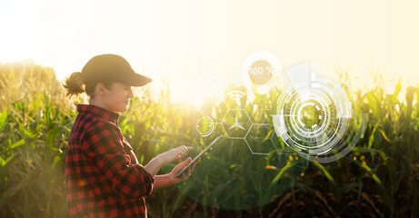 Farmer  with a digital tablet in the agricultural field.
