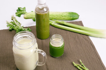 Glass jar mugs with green health smoothie. Copy space. Raw, vegan, vegetarian, alkaline food concept. Banner.