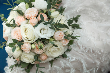 A bouquet of roses in delicate pastel shades.