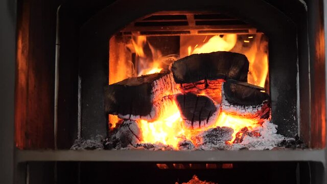 firewood burning in the furnace firebox red flame