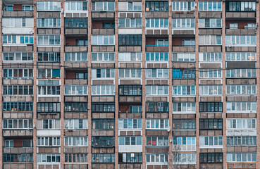 Balconies on a soviet era building. Old apartment building. Front view close up.