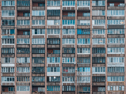 Balconies on a soviet era building. Old apartment building. Front view close up.