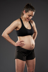 Pregnant bodybuilder lady working out