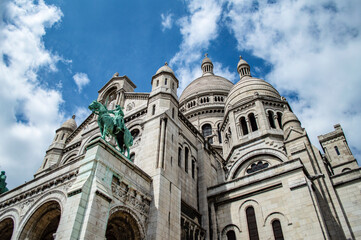 Paris, France - July 19, 2019: Basilica of the Sacred Heart (SacrÃ© Coeur) of Paris, France, on a sunny summer day.