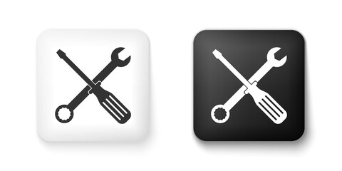 Black and white Spanner and screwdriver tools icon isolated on white background. Service tool symbol. Square button. Vector.