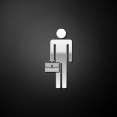 Silver Businessman man with briefcase icon isolated on black background. Long shadow style. Vector.