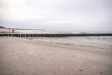 Fototapeta na wymiar landscape by the baltic sea on a calm gray cold day in Poland