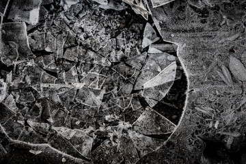 nteresting abstract background with ice close-up on a frozen puddle